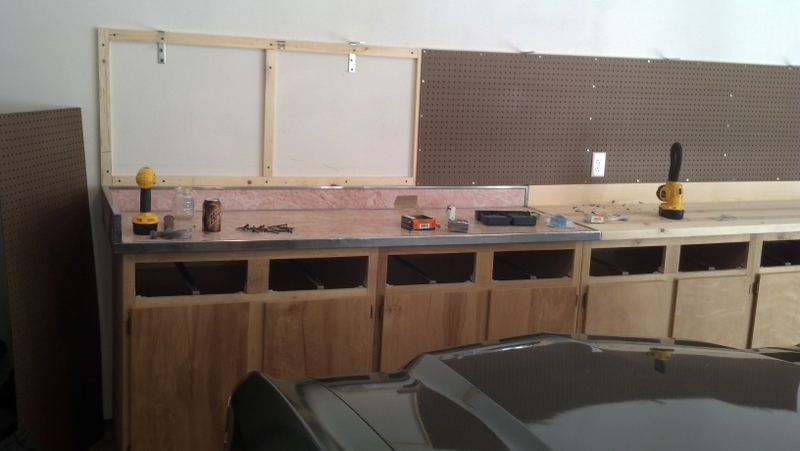 The yet-to-be-purchased huge air compressor will go to the left of the cabinets in the corner.